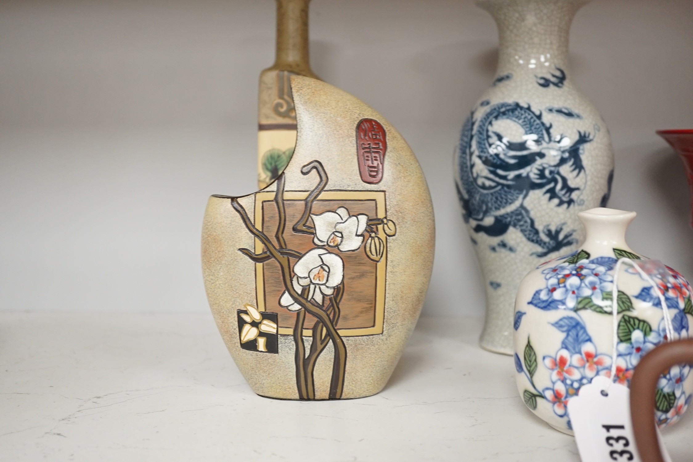 A Chinese blue and white dragon crackle glaze vase, together with a group of Chinese and Oriental ceramics. Tallest 23cm